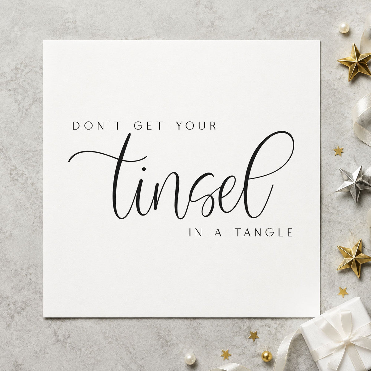 Don't Get Tinsel Tangled rubber stamp printed in black ink, ready for priority list sheet and similar paper crafts.