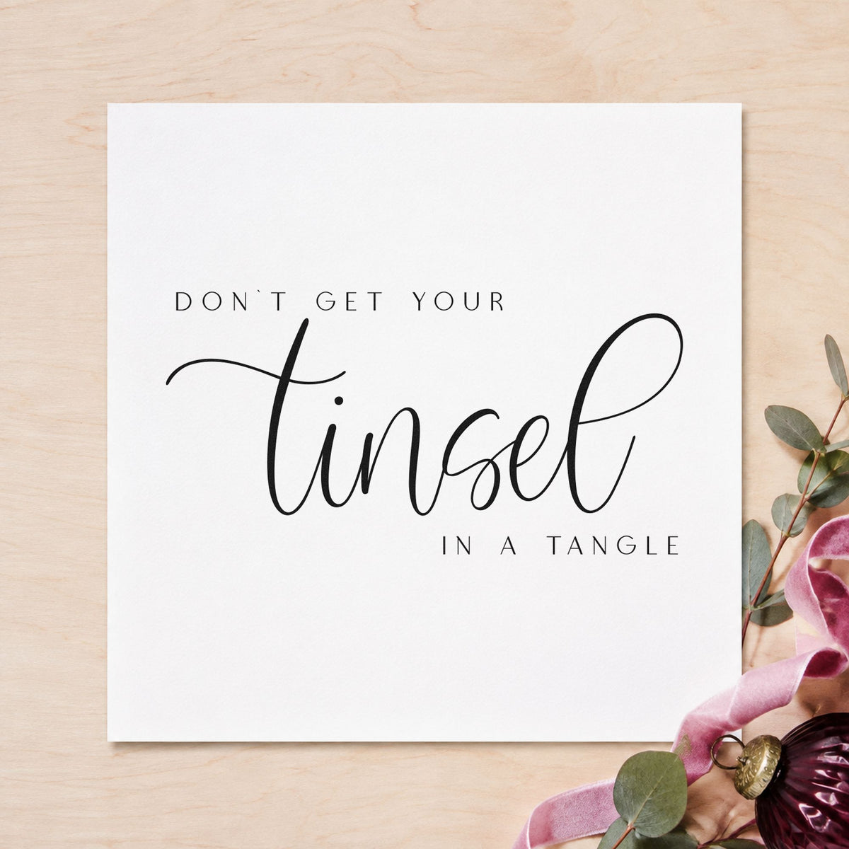 Don't Get Tinsel Tangled rubber stamp printed in black ink, ready for tinsel tangle cards and similar paper crafts.