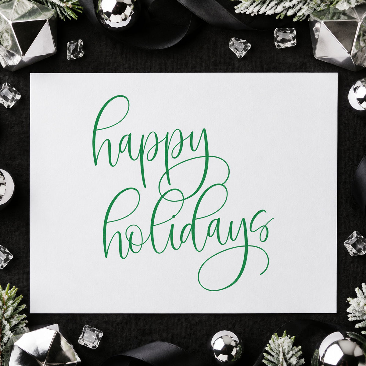 Happy Holidays Flourished Calligraphy craft stamp imprinted in green ink on paper, a design suited to framed glass pair.