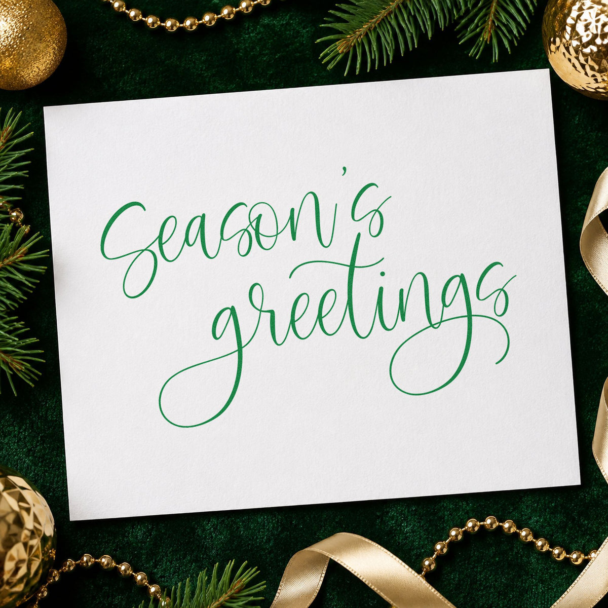Season's Greetings Fine Calligraphy craft stamp in green ink on cardstock, an easy option for sample album page.