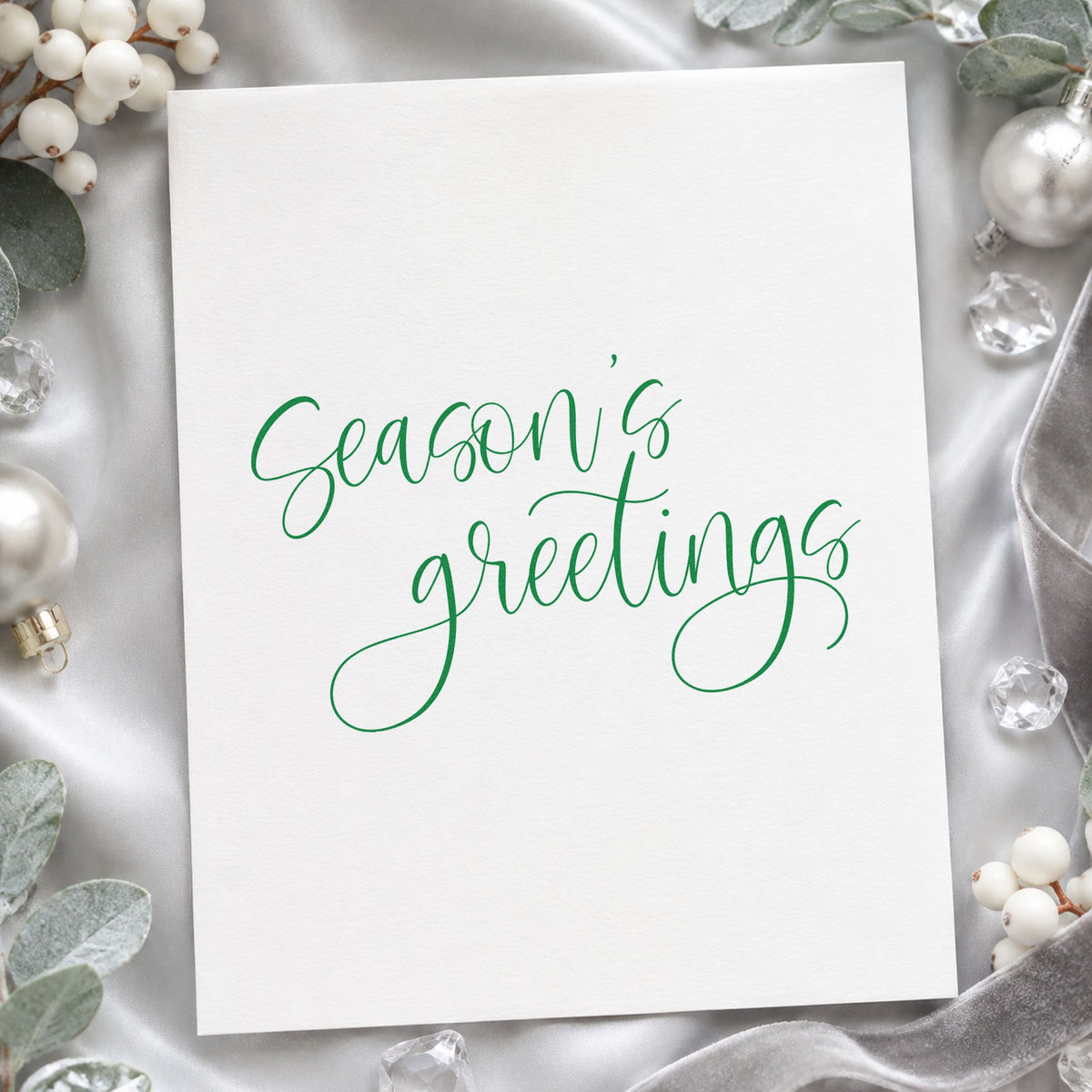 Season's Greetings Fine Calligraphy craft stamp imprinted in green ink on paper, a design suited to framed foyer piece.