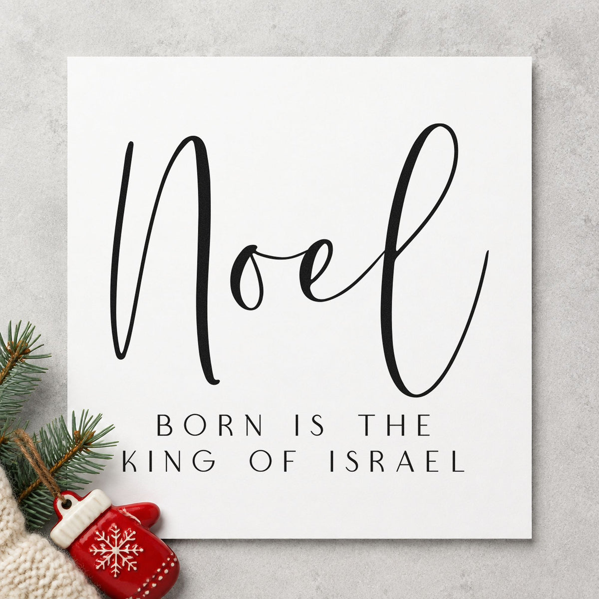 Noel King Of Israel craft stamp imprint in black ink on a handmade project, one idea being hymnal gift tags.