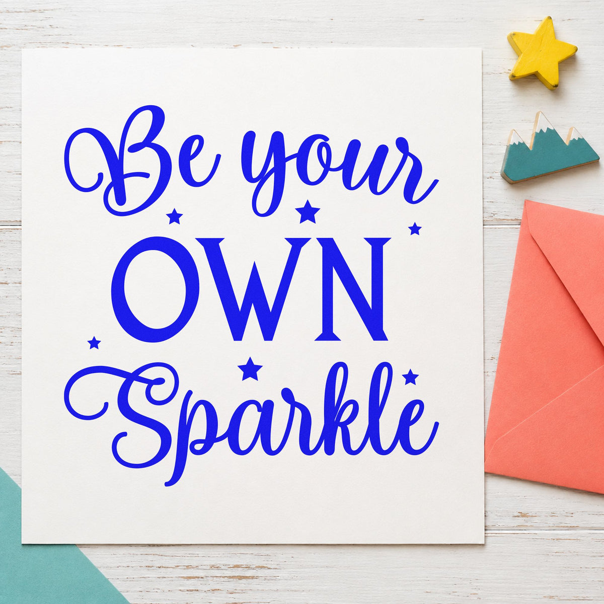 Be Your Own Sparkle craft stamp imprinted in blue ink on paper, a design suited to framed vanity ledge.