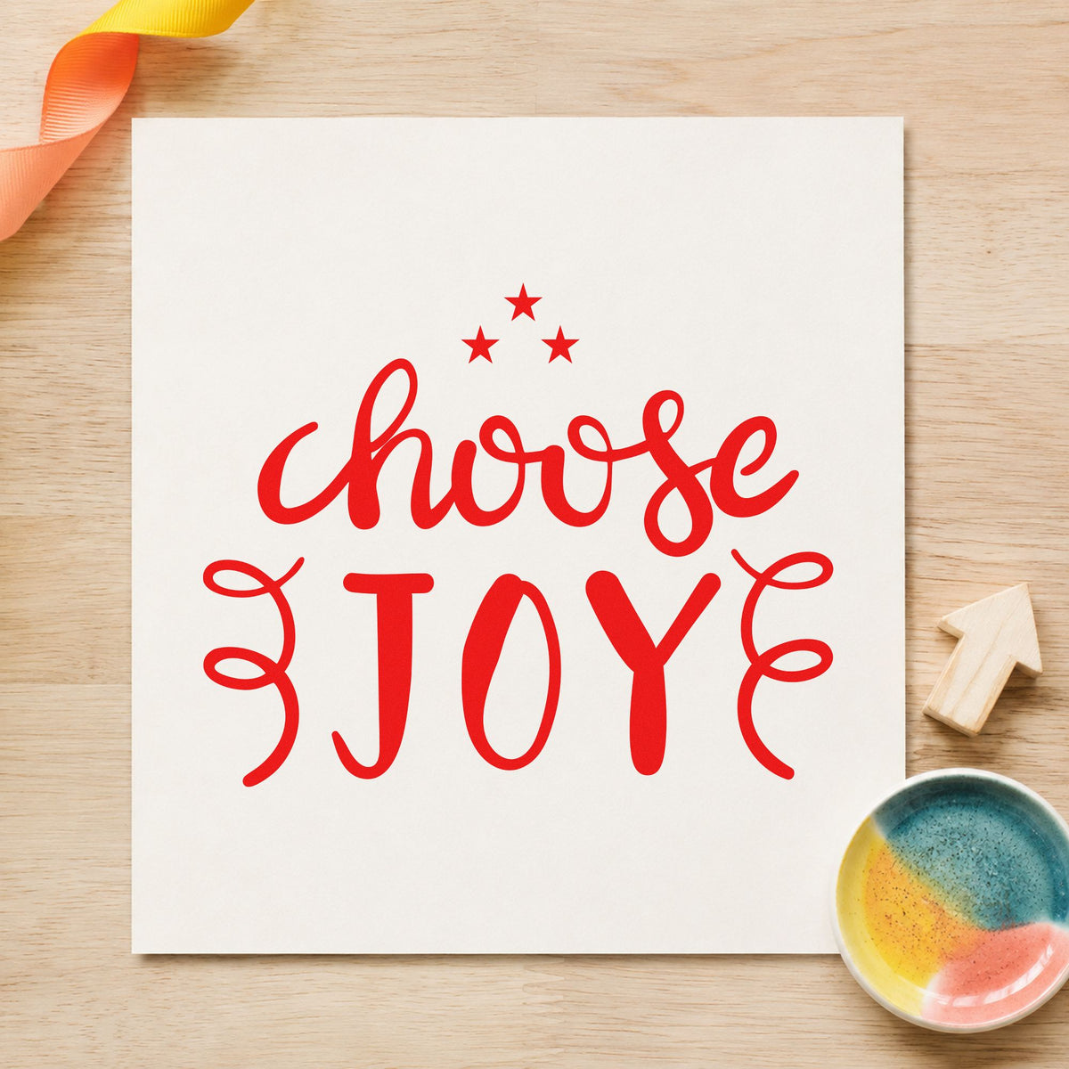 Choose Joy Stars Flourishes craft stamp imprint in red ink on a handmade project, one idea being prompt deck cards.