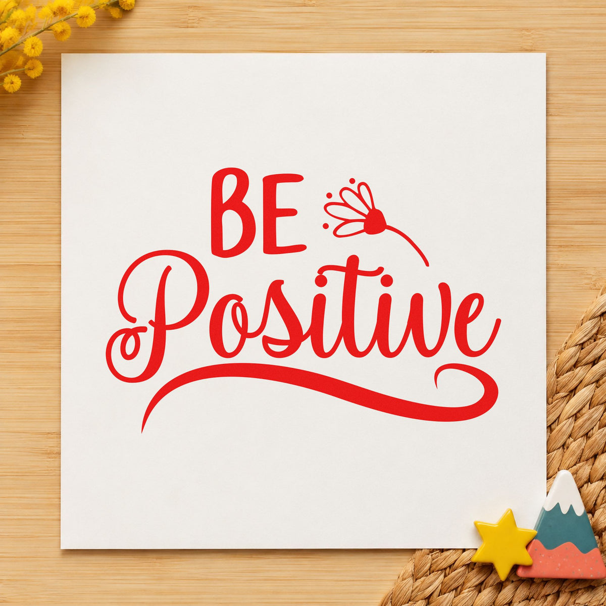 Be Positive Flower Script craft stamp imprint in red ink on a handmade project, one idea being care slip cards.