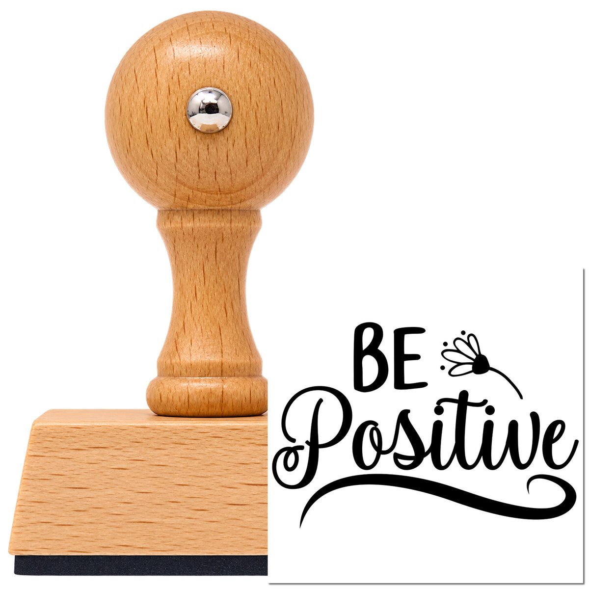 Be Positive Flower Script Vintage Pro rubber stamp in European beech wood with a round knob handle, shown beside its black imprint.