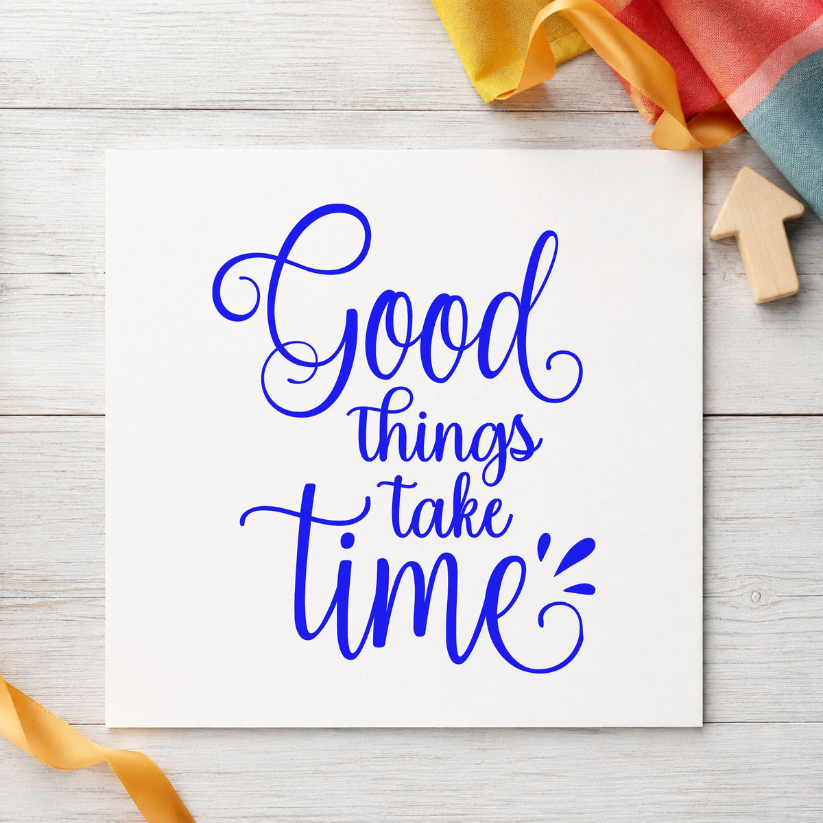 Good Things Take Time craft stamp in blue ink on cardstock, an easy option for cloth cover printing.