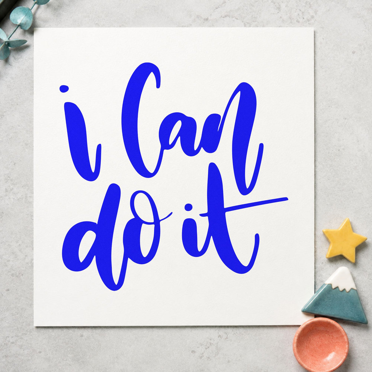 I Can Do It craft stamp imprinted in blue ink on paper, a design suited to framed homework desk.