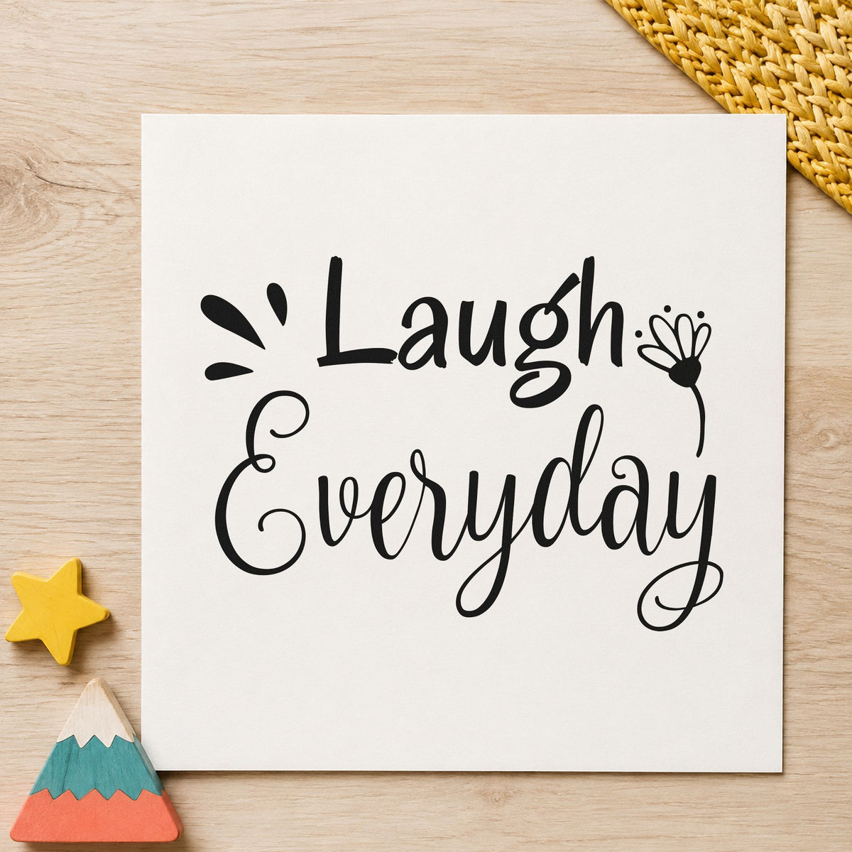 Laugh Every Day Flower rubber stamp printed in black ink, ready for bouncing baseline cards and similar paper crafts.