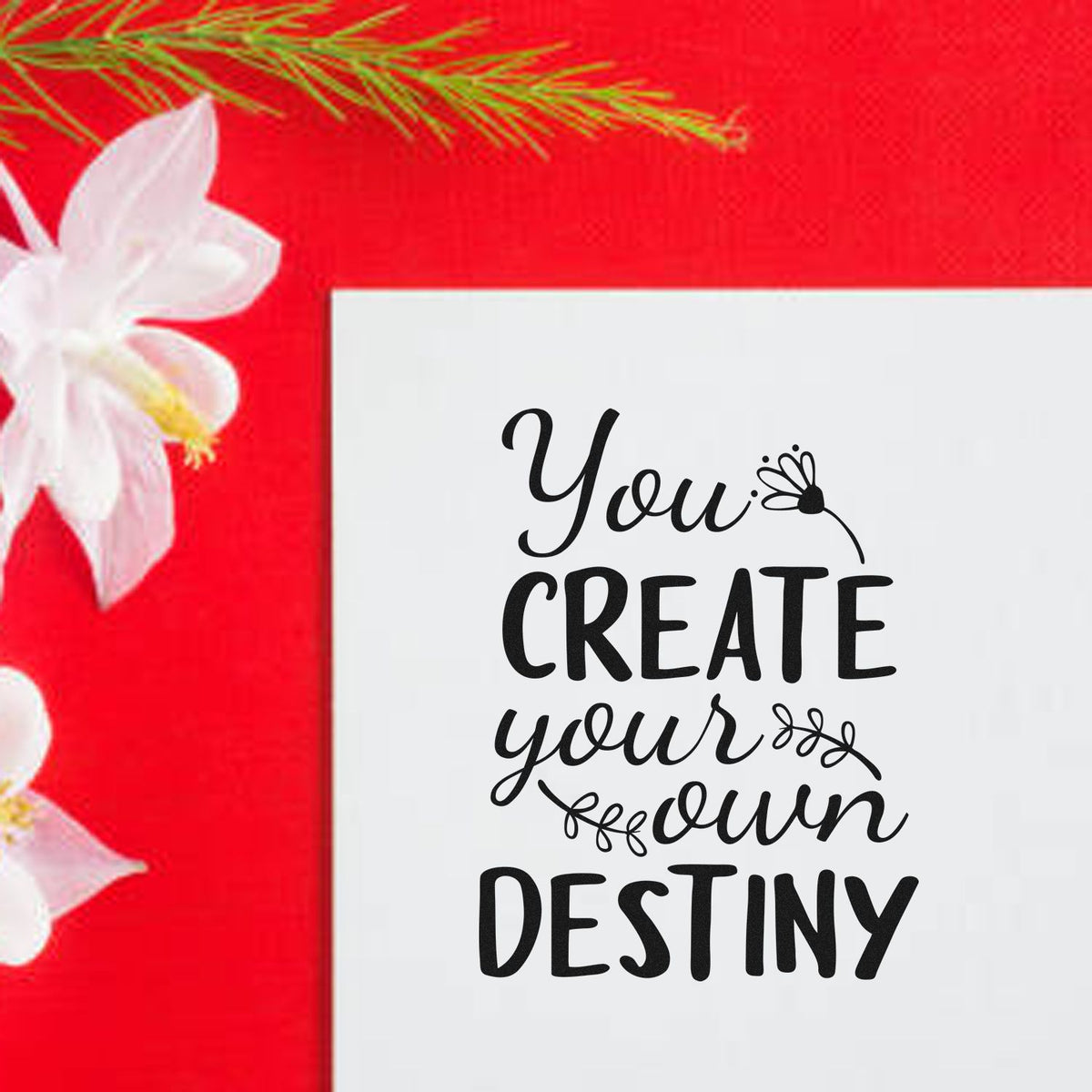 You Create Your Own Destiny Premium Wooden Stamp - Vintage Pro imprint stamped in black ink. The phrase "You create your own destiny" appears with a small flower and leafy sprigs.