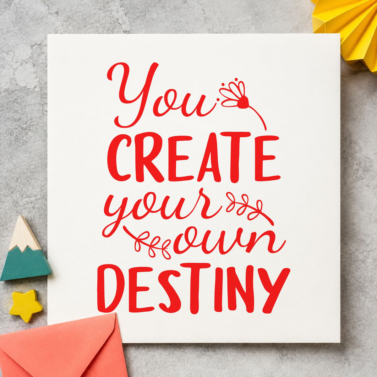 Create Your Own Destiny craft stamp imprint in red ink on a handmade project, one idea being advice slip cards.