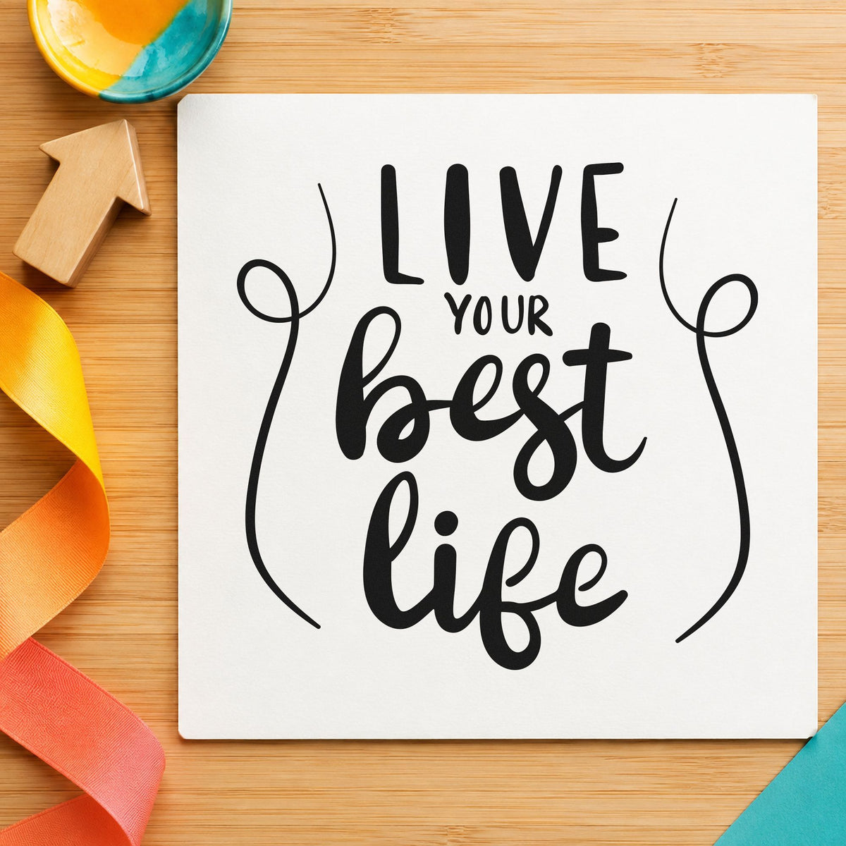Live Your Best Life craft stamp imprint in black ink on a handmade project, one idea being luggage gift tags.