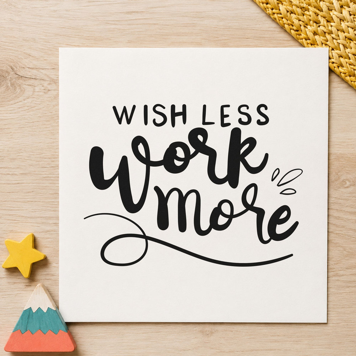 Wish Less Work More craft stamp imprint in black ink on a handmade project, one idea being finished piece tags.