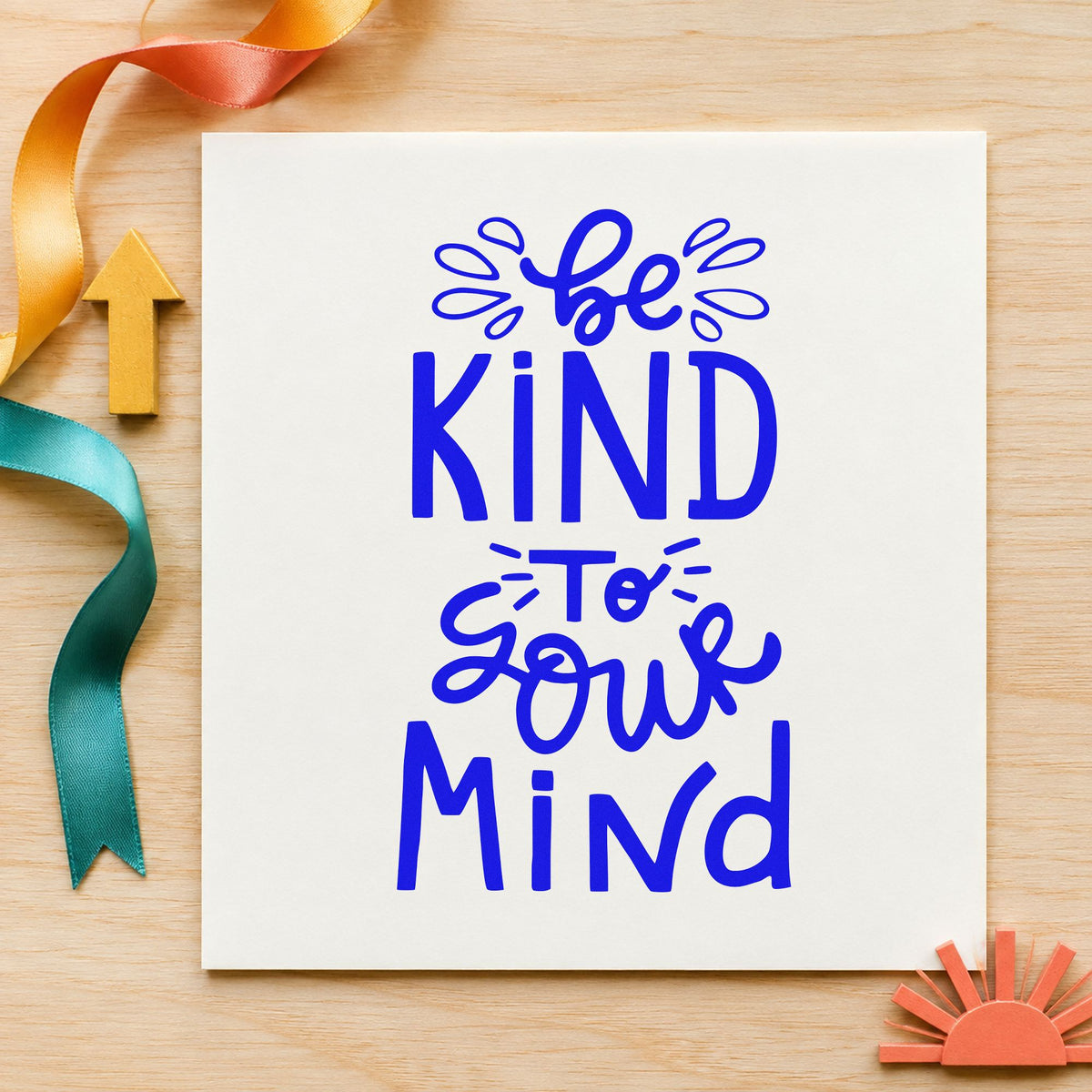 Be Kind To Your Mind craft stamp in blue ink on cardstock, an easy option for sit cushion printing.