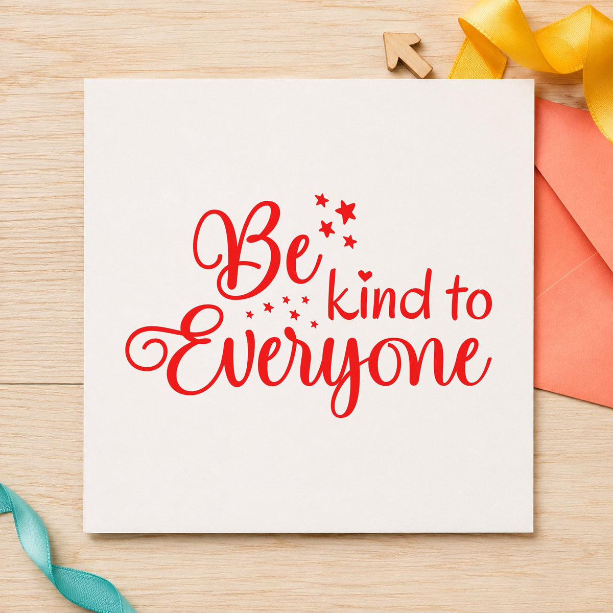 Be Kind To Everyone rubber stamp shown in red ink, stamped for projects such as cubby name labels.