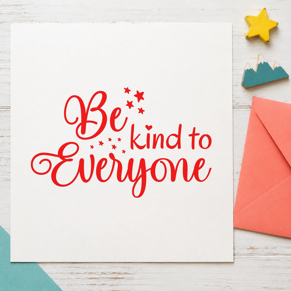 Be Kind To Everyone craft stamp imprint in red ink on a handmade project, one idea being compliment slip cards.