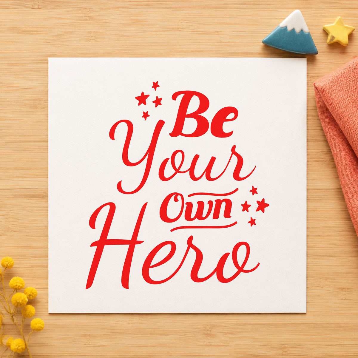 Be Your Own Hero rubber stamp shown in red ink, stamped for projects such as bin costume labels.