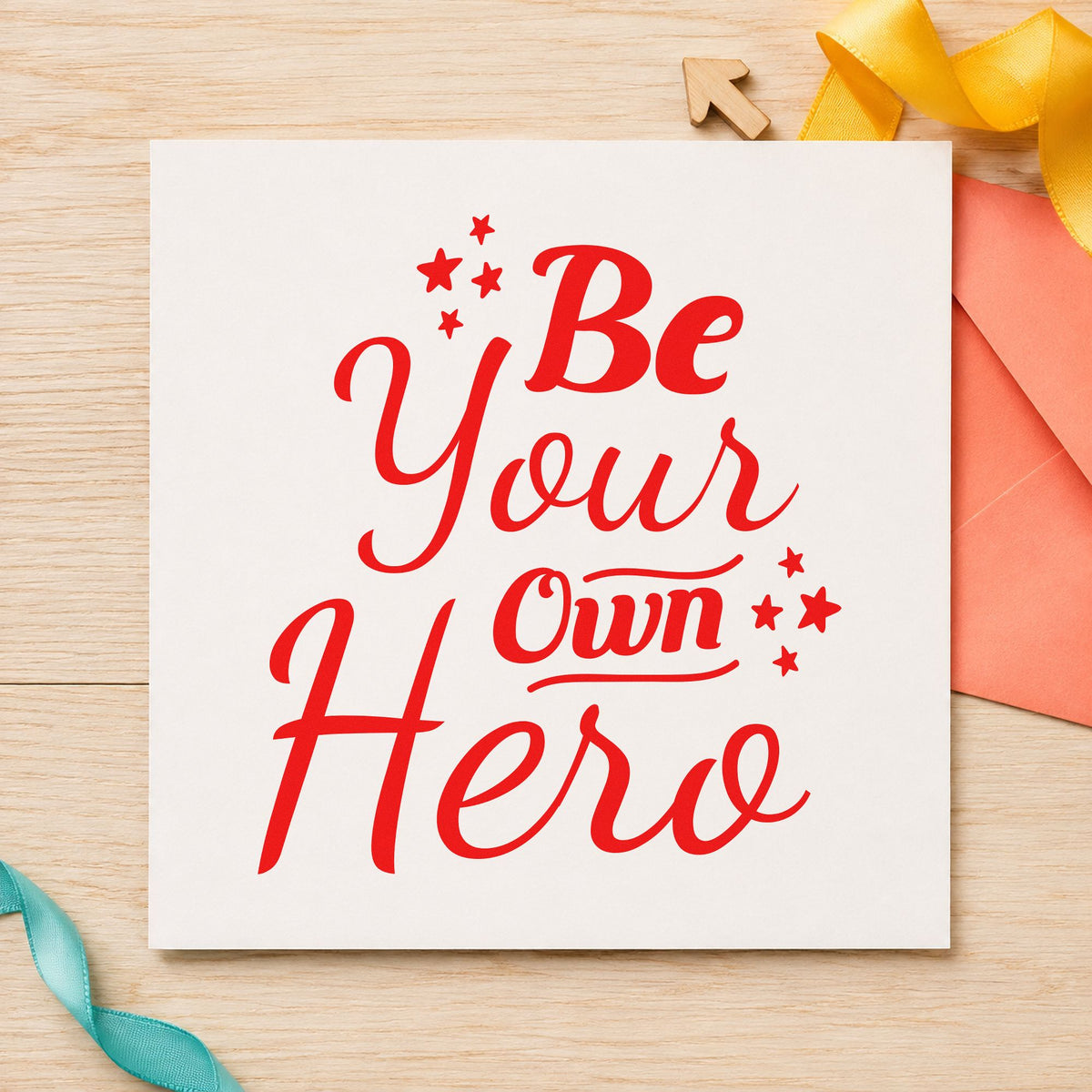 Be Your Own Hero craft stamp imprint in red ink on a handmade project, one idea being hero name cards.