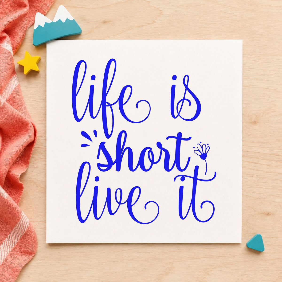 Life Is Short Live It craft stamp imprinted in blue ink on paper, a design suited to framed garage wall.