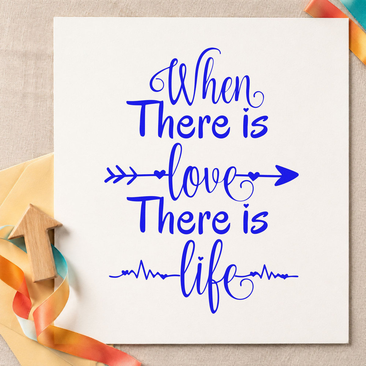 When There Is Love craft stamp in blue ink on cardstock, an easy option for quilt corner printing.