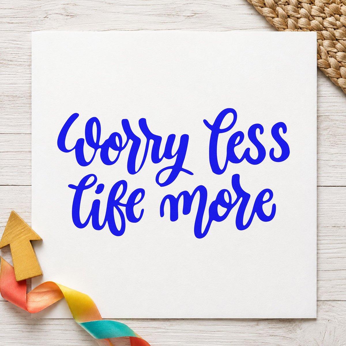 Worry Less Live More craft stamp in blue ink on cardstock, an easy option for camp flag printing.