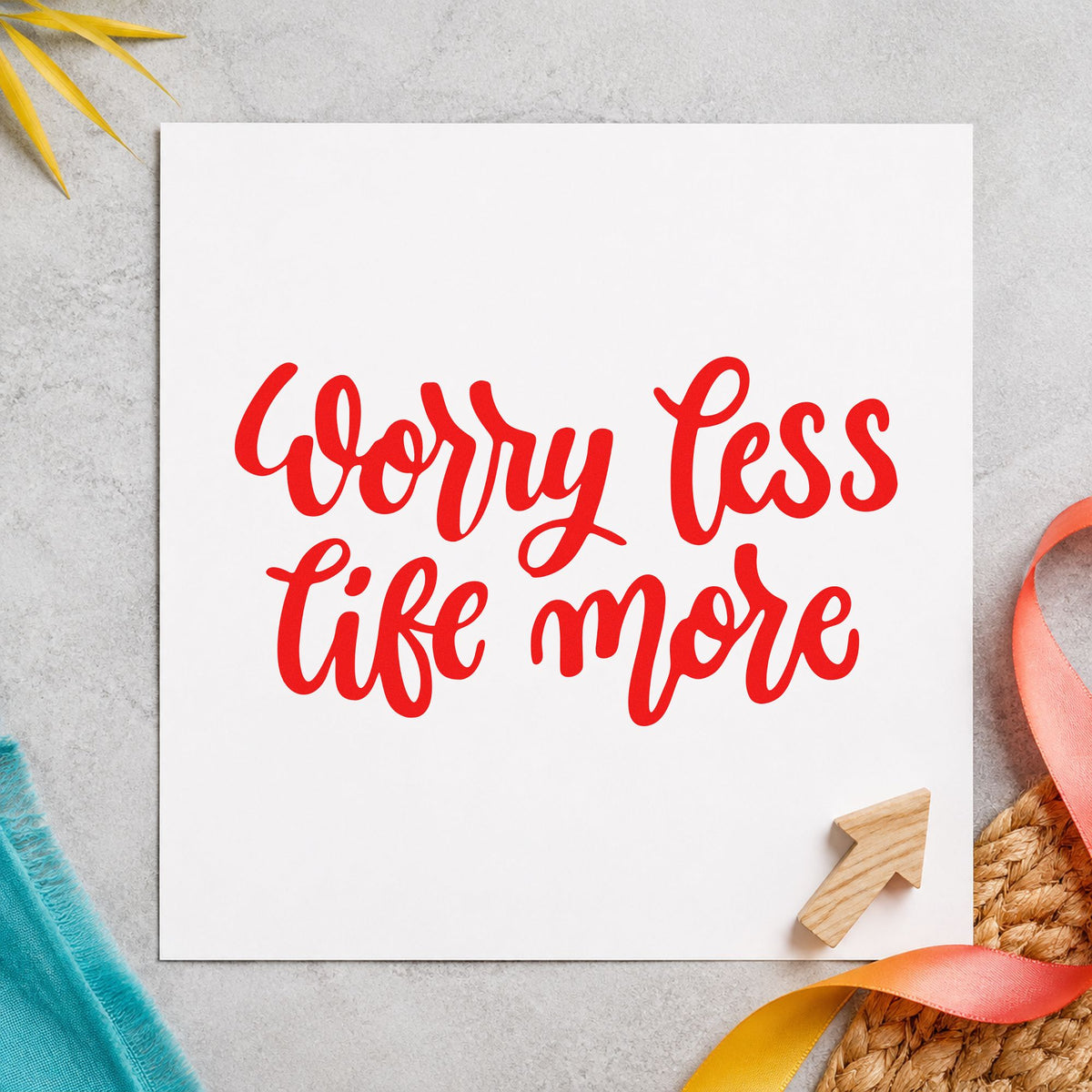Worry Less Live More rubber stamp shown in red ink, stamped for projects such as bin gear labels.
