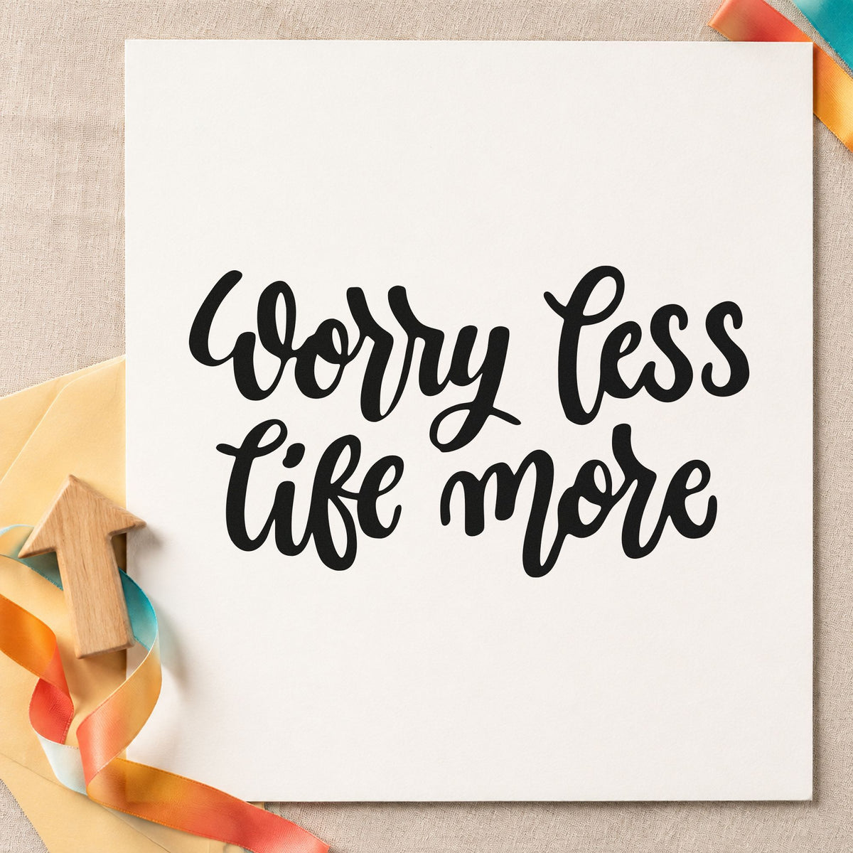 Worry Less Live More rubber stamp printed in black ink, ready for two line cards and similar paper crafts.