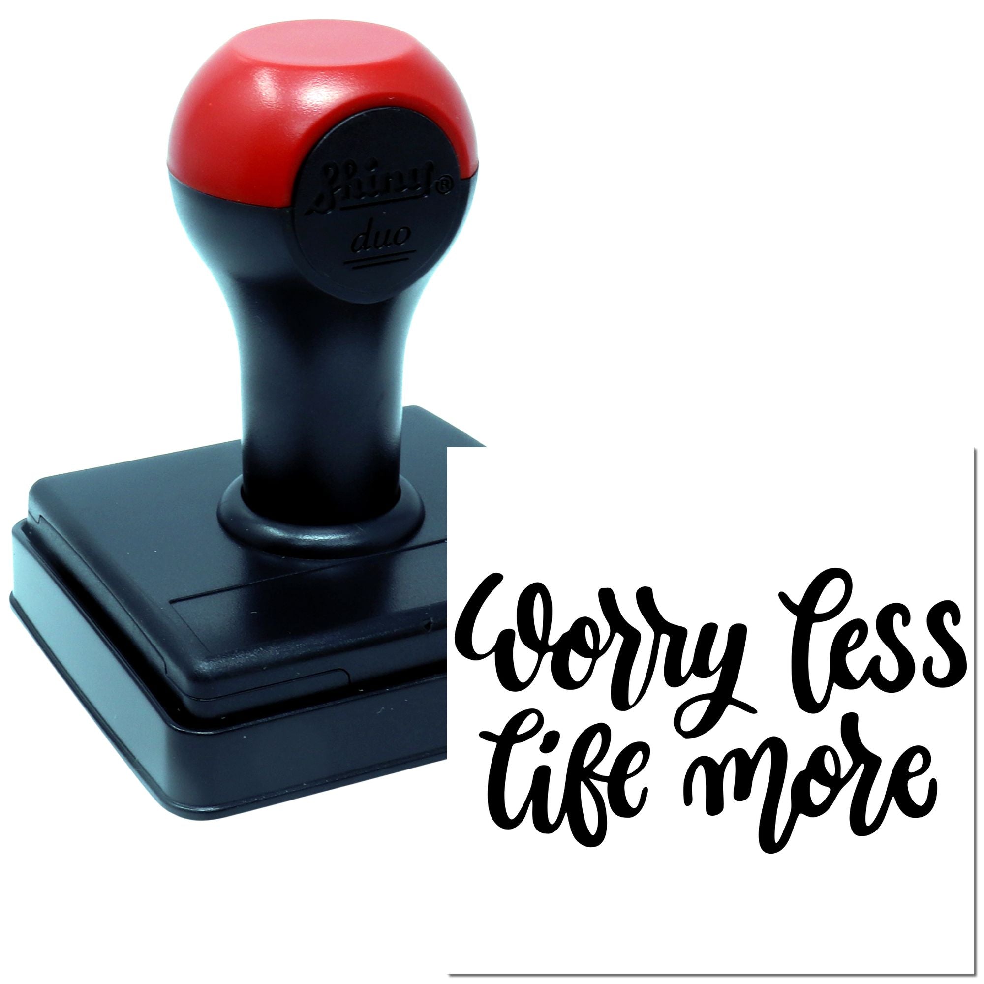 Self-inking rubber stamp with Worry Less, Life More motivational phrase for crafting, packaging, and personalized stamping.