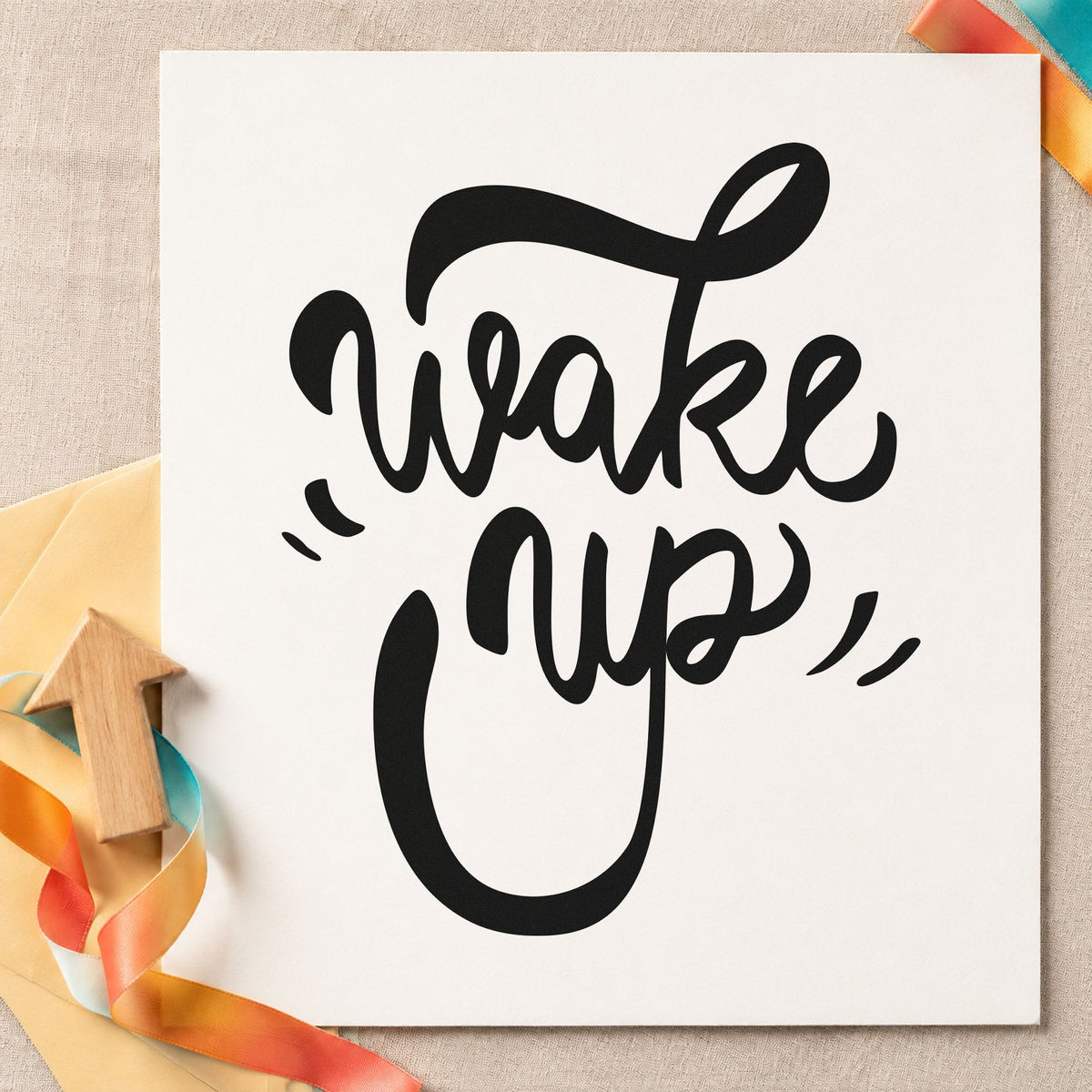 Wake Up Bold Script craft stamp in black ink on cardstock, an easy option for bakery album page.