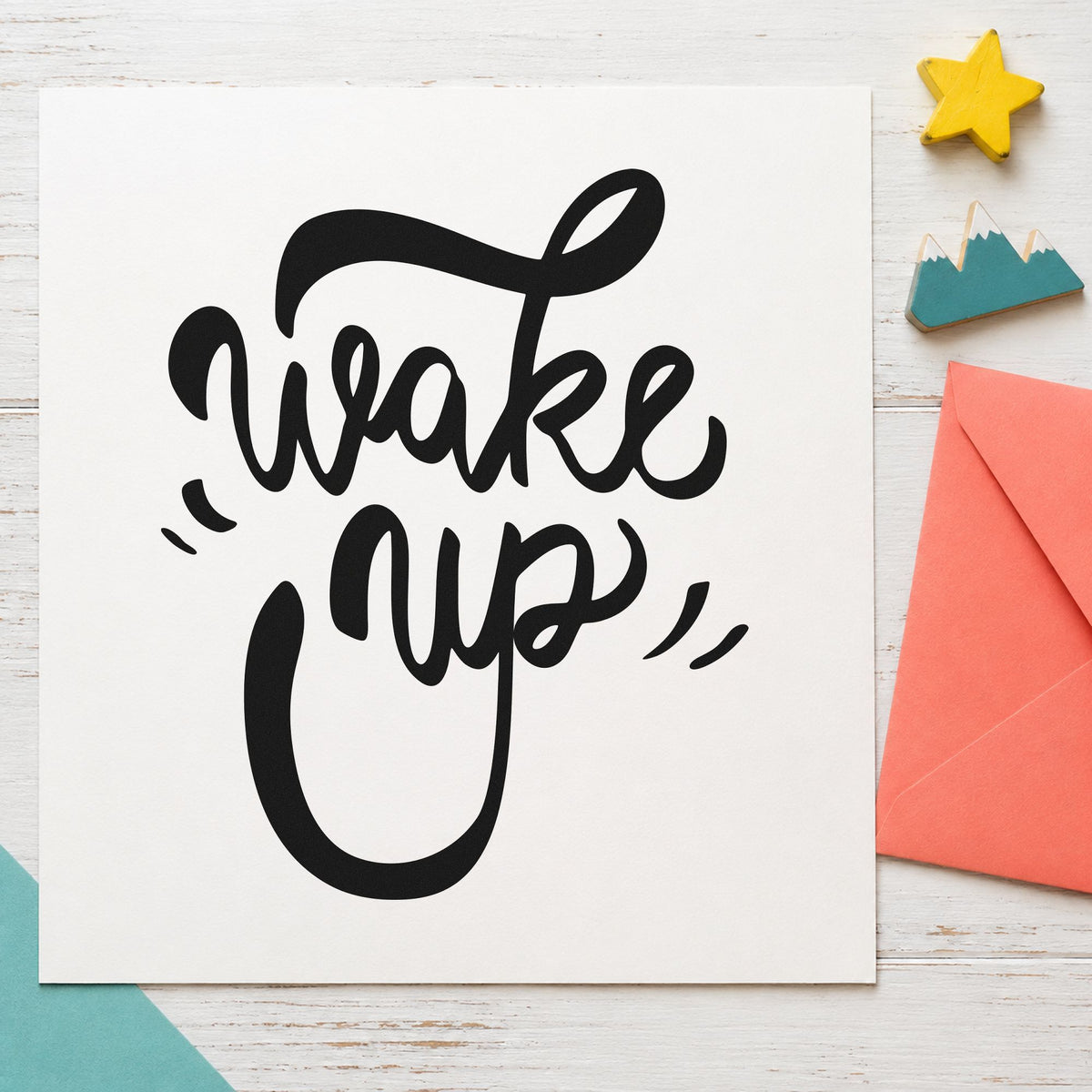 Wake Up Bold Script rubber stamp printed in black ink, ready for curled accent cards and similar paper crafts.