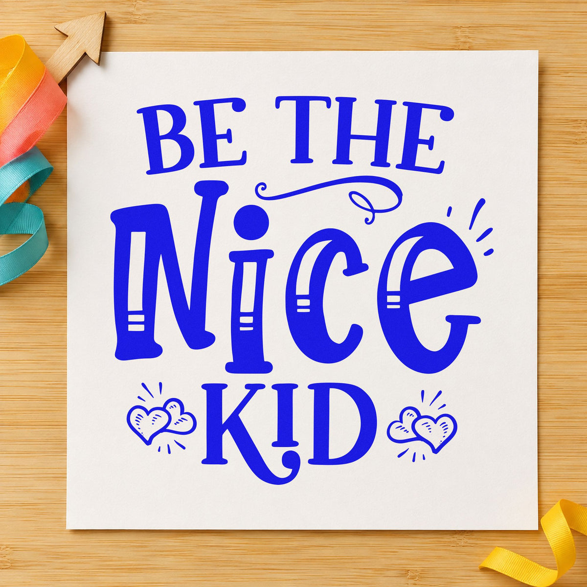 Be The Nice Kid craft stamp imprinted in blue ink on paper, a design suited to framed mess hall.