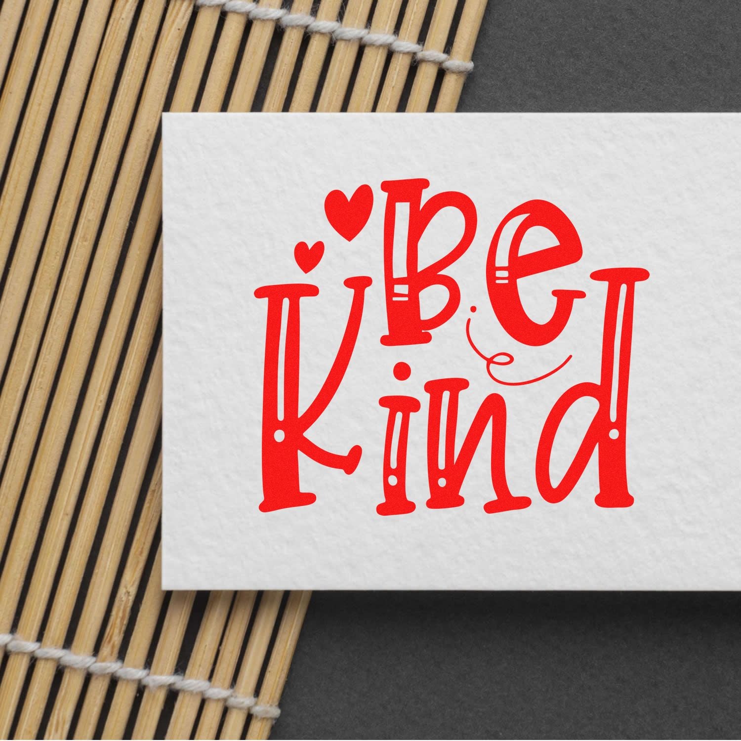Custom rubber stamp design with red Be Kind lettering for cards, crafts, and packaging.