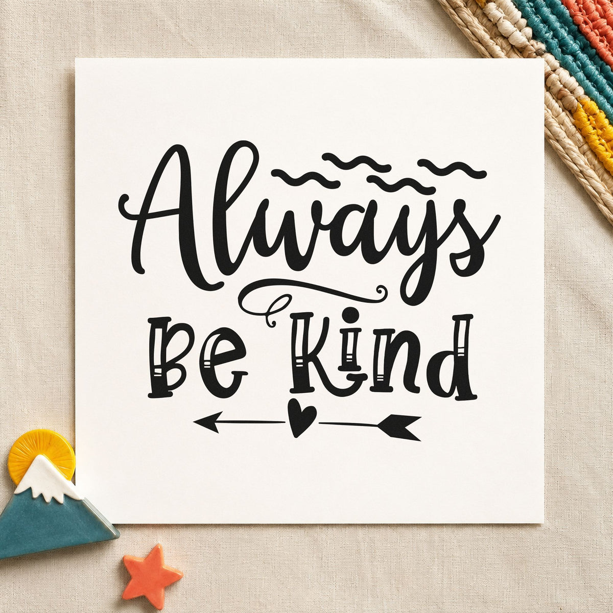 Always Be Kind Arrow craft stamp imprint in black ink on a handmade project, one idea being treat pouch gift tags.