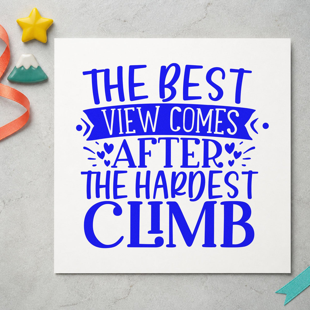 Best View After Hardest Climb craft stamp imprinted in blue ink on paper, a design suited to framed gear room.