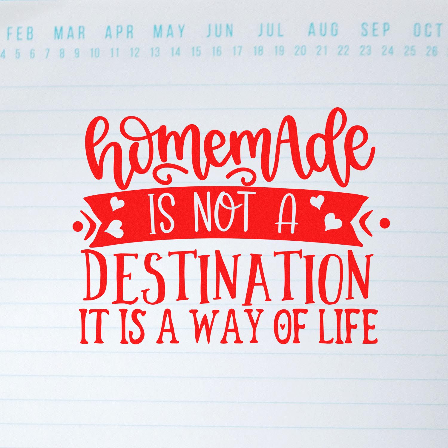 Red homemade rubber stamp design with hearts and banner quote: Homemade is not a destination, it is a way of life.