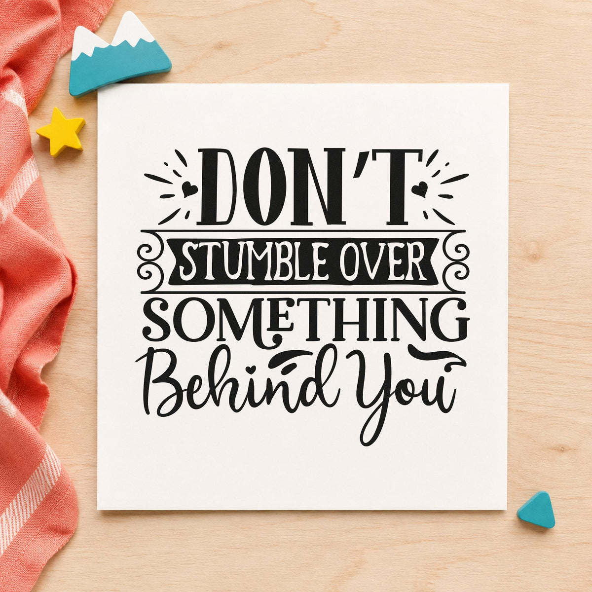 Don't Stumble Over Behind You craft stamp in black ink on cardstock, an easy option for move album page.