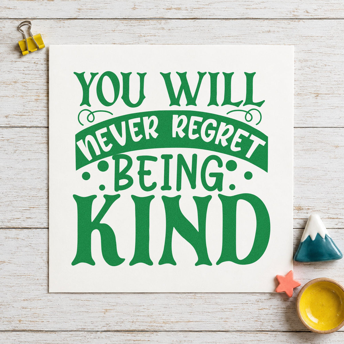 Never Regret Being Kind craft stamp in green ink on cardstock, an easy option for café album page.