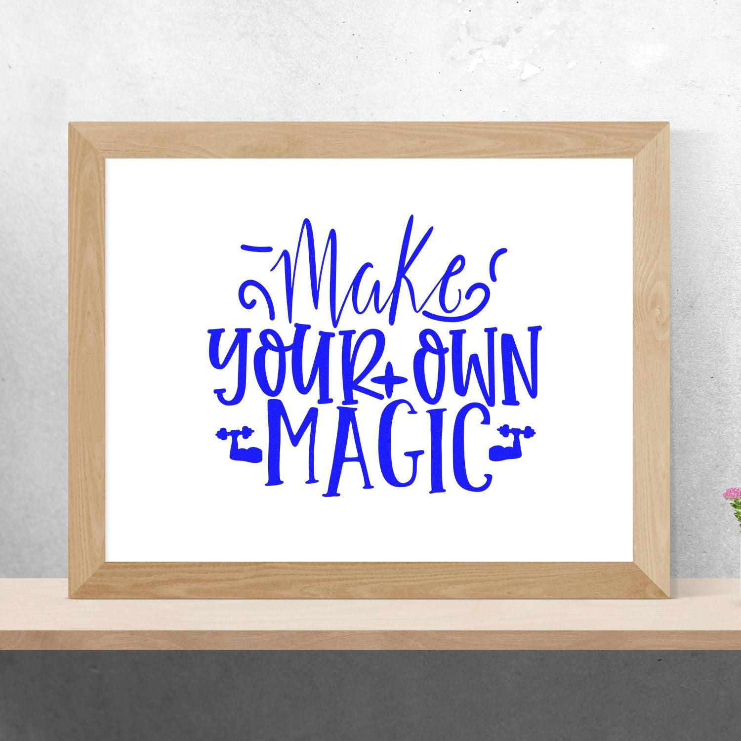 Make Your Own Magic custom rubber stamp design with playful blue lettering for crafting, stationery, and handmade branding.