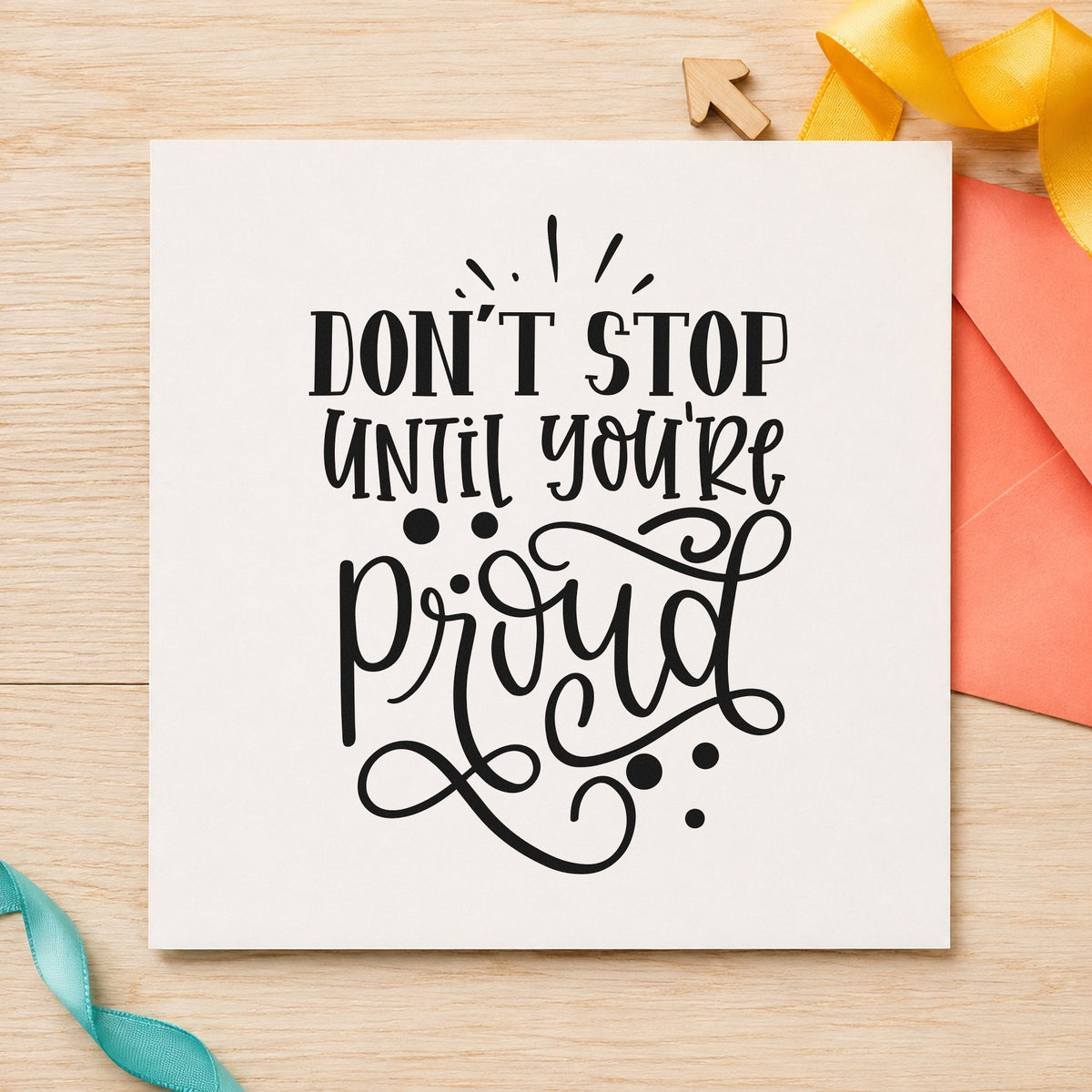 Don't Stop Until Proud craft stamp imprint in black ink on a handmade project, one idea being print folder gift tags.