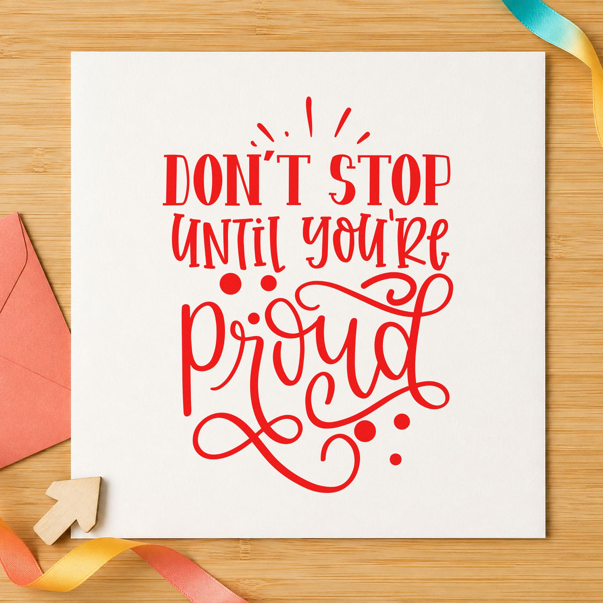 Don't Stop Until Proud rubber stamp shown in red ink, stamped for projects such as drawer series labels.