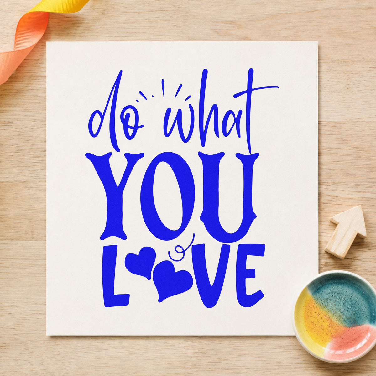 Do What You Love Hearts craft stamp in blue ink on cardstock, an easy option for chef coat printing.