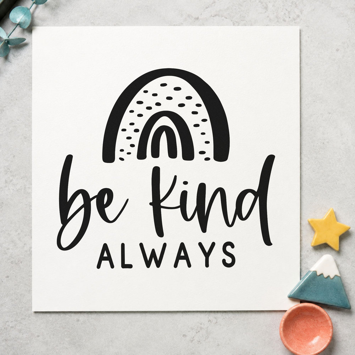 Be Kind Always Rainbow craft stamp imprint in black ink on a handmade project, one idea being snack bag gift tags.