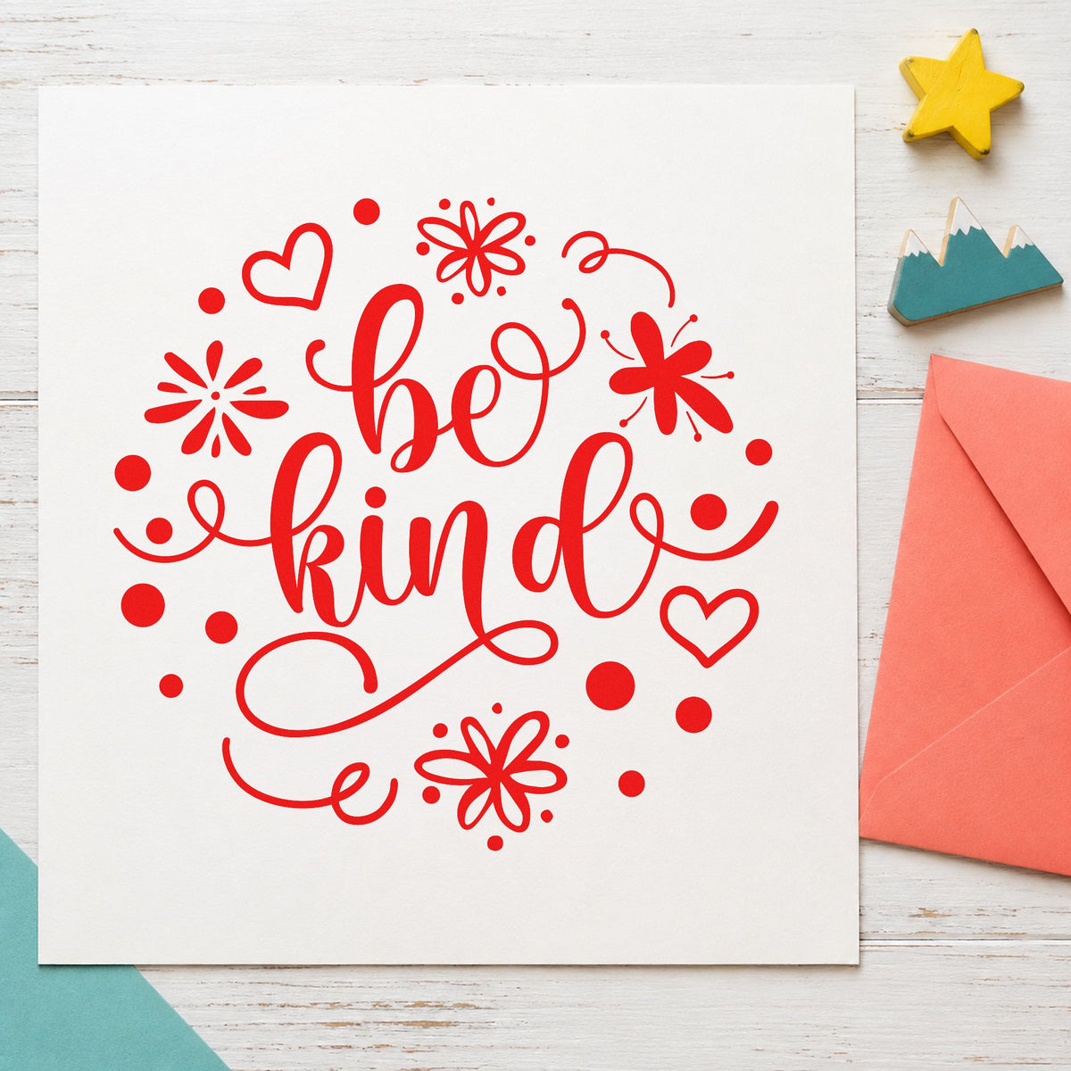 Be Kind Flowers Hearts craft stamp imprint in red ink on a handmade project, one idea being care note cards.