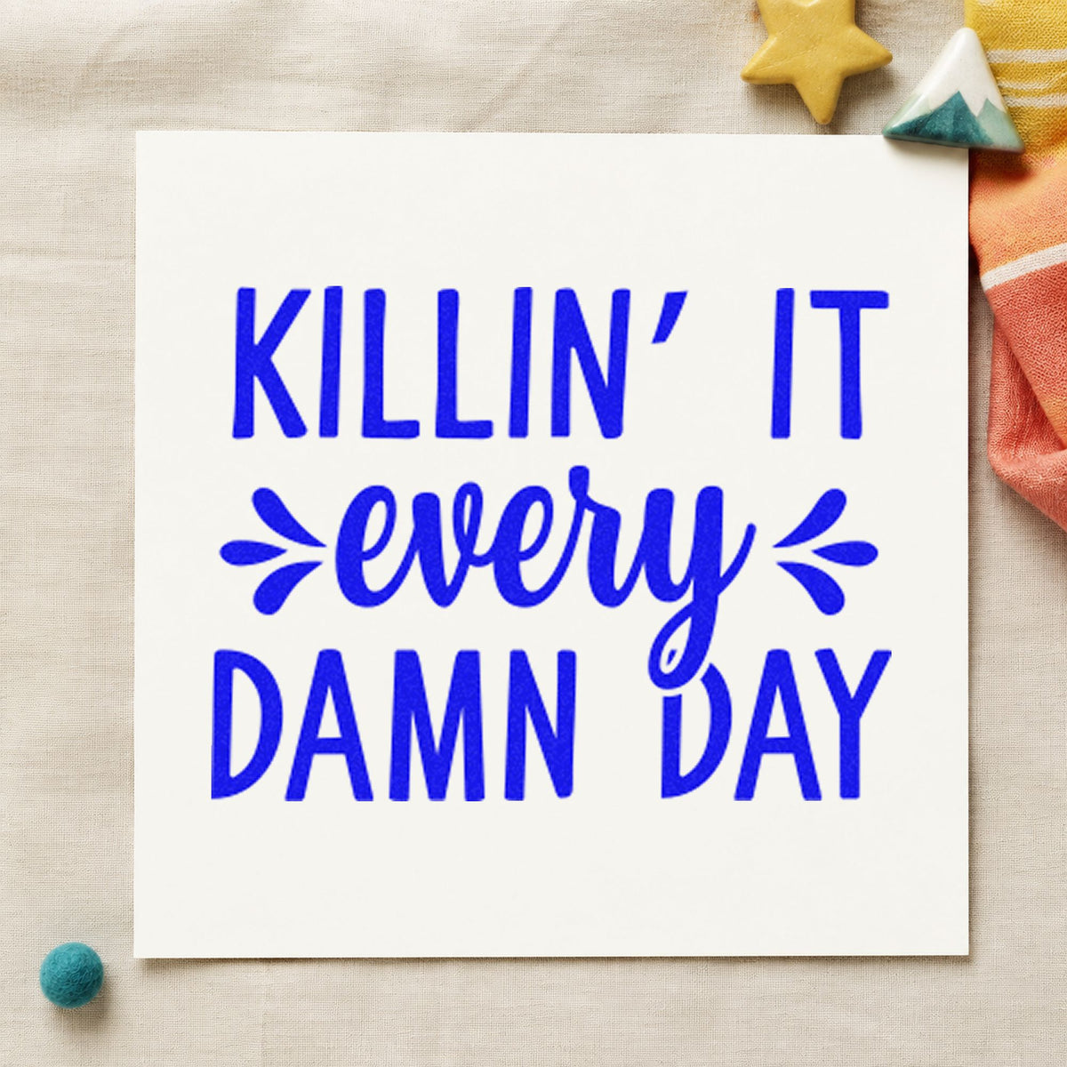 Killin It Every Damn Day craft stamp imprinted in blue ink on paper, a design suited to framed waiting bench.
