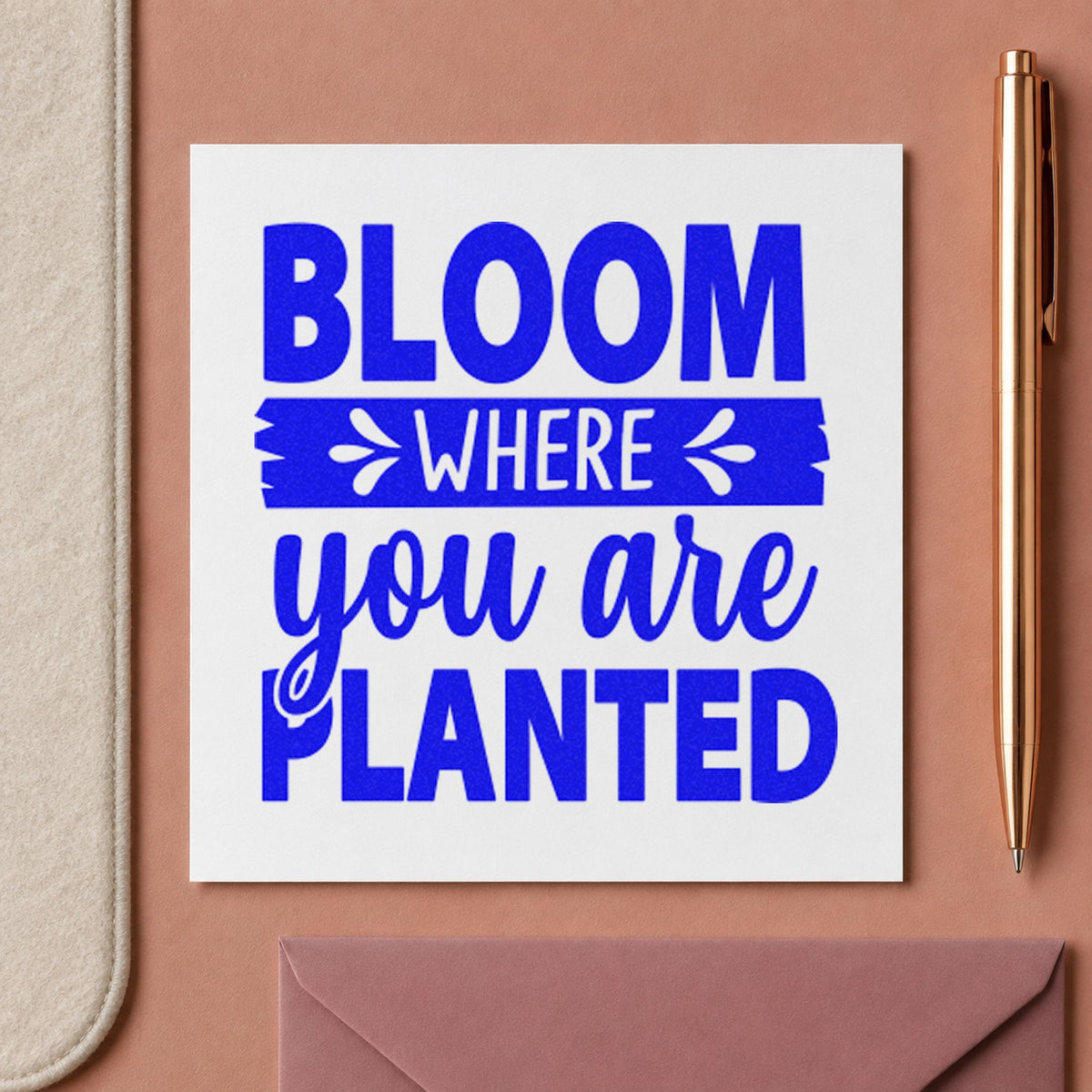 Bloom Where You Are Planted craft stamp in blue ink on cardstock, an easy option for plant sleeve printing.