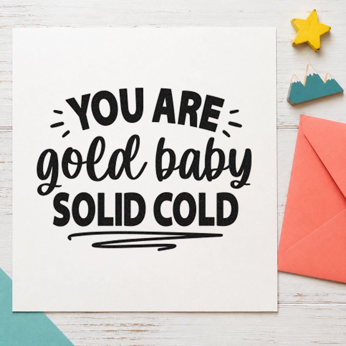 You Are Solid Gold craft stamp imprint in black ink on a handmade project, one idea being prize bag gift tags.