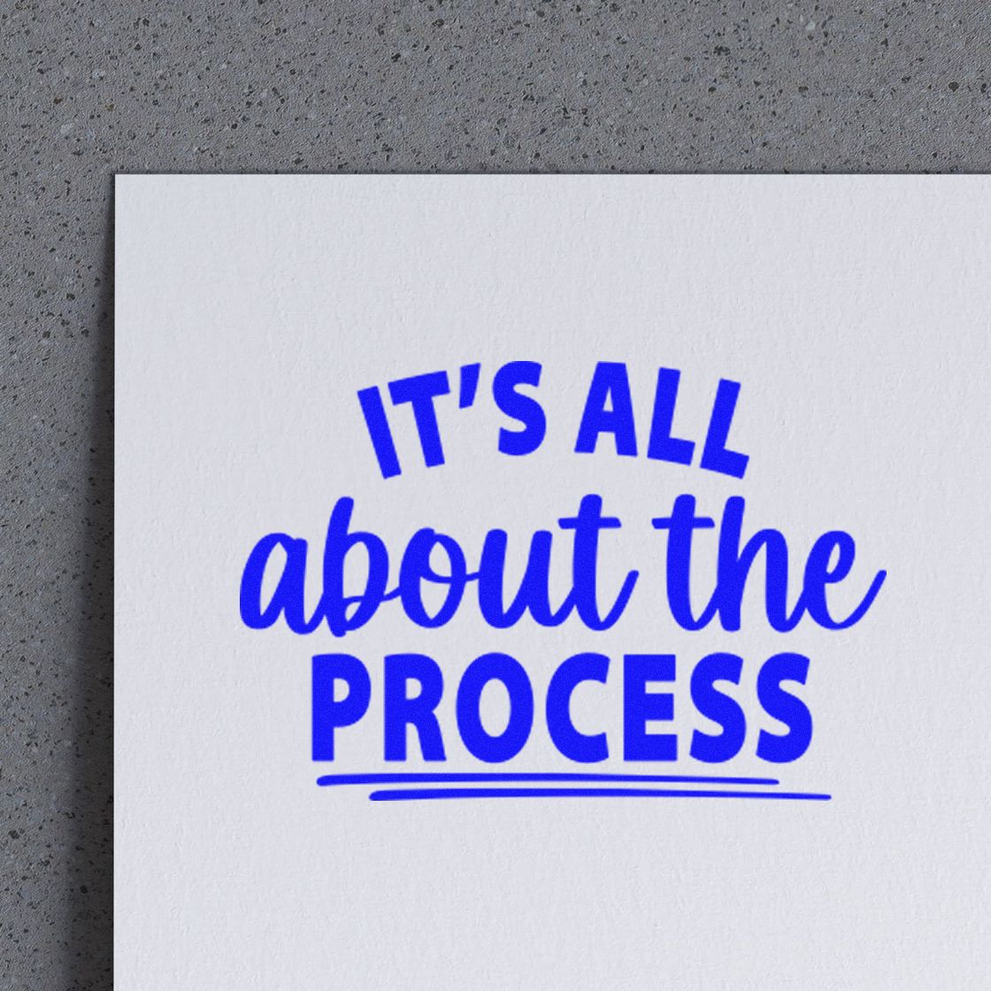 Custom rubber stamp impression reading Its all about the process in blue ink on paper.
