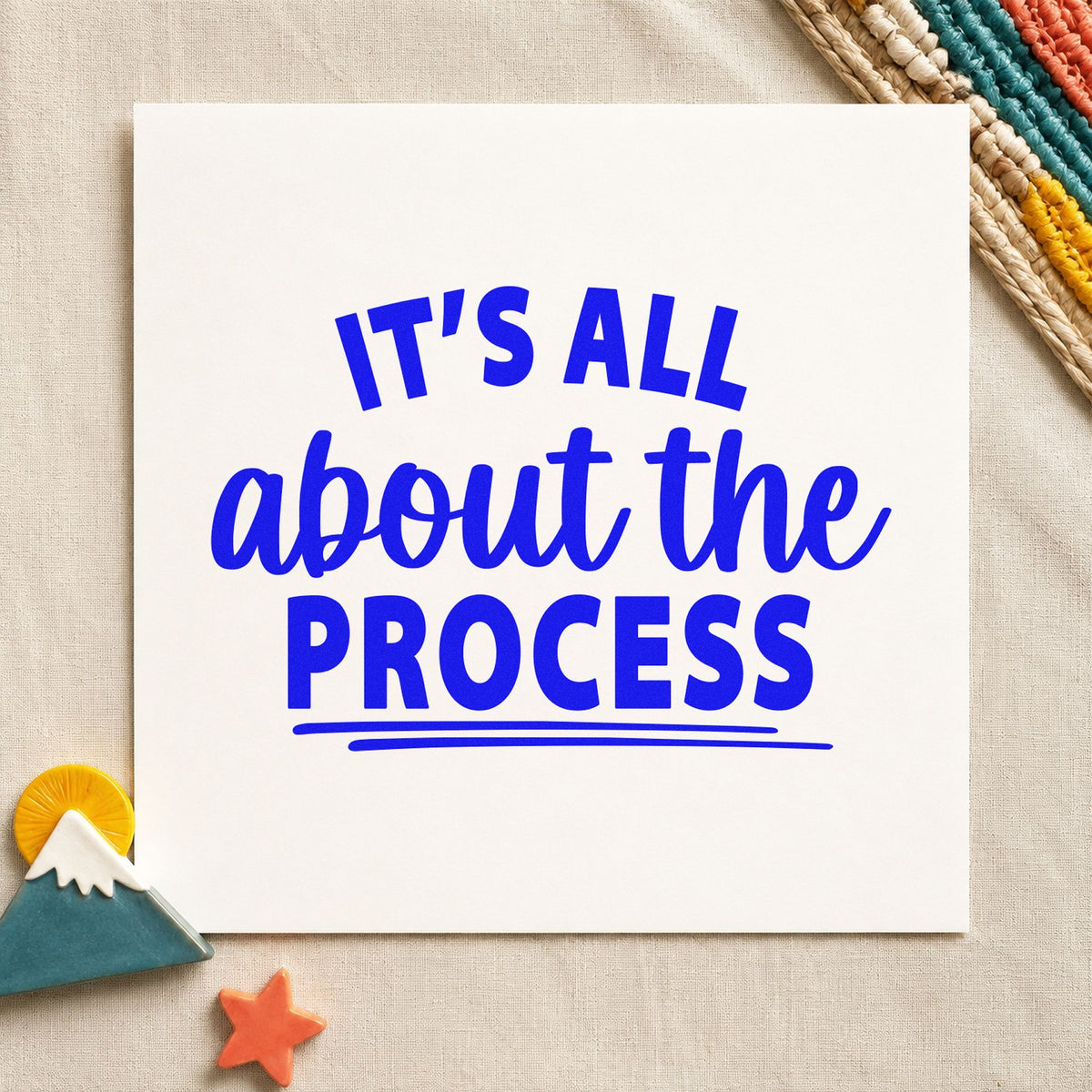 All About The Process craft stamp in blue ink on cardstock, an easy option for darkroom apron printing.