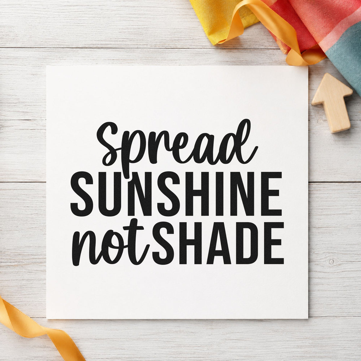 Spread Sunshine Not Shade craft stamp imprint in black ink on a handmade project, one idea being bouquet gift tags.