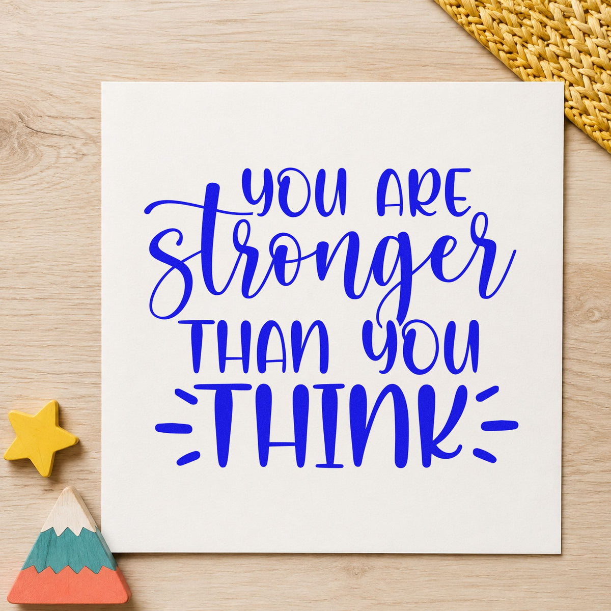 You Are Stronger Than Think craft stamp in blue ink on cardstock, an easy option for team band printing.